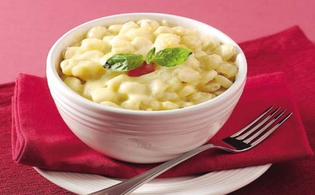 Choclos gratinados con queso mantecoso
